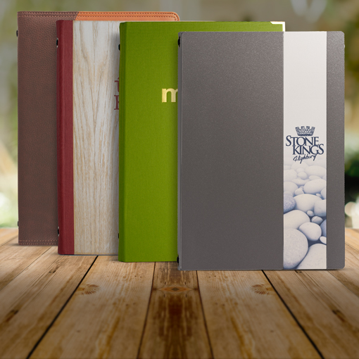 Restaurant menu holders, menu covers for hotels available in different materials and sizes. Aluminium, wood, fabric, laminated material, synthetic leather, hardback style, boxsets. They can be personalised with your logo or design