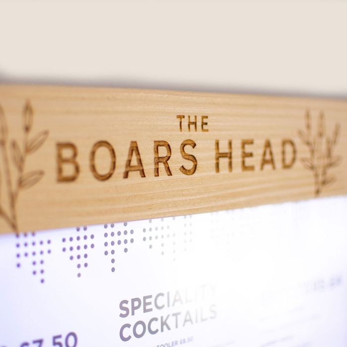 Wood engraved menu case header