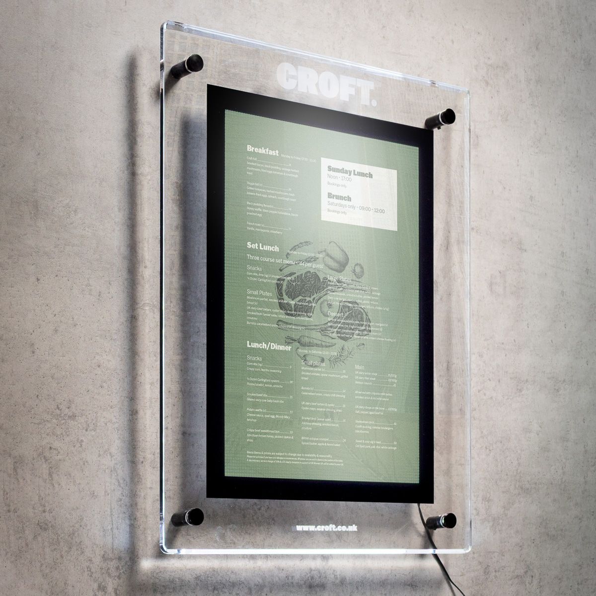 Wall mounted Crystallite acrylic menu case with engraved logo, lit from behind on a concrete wall