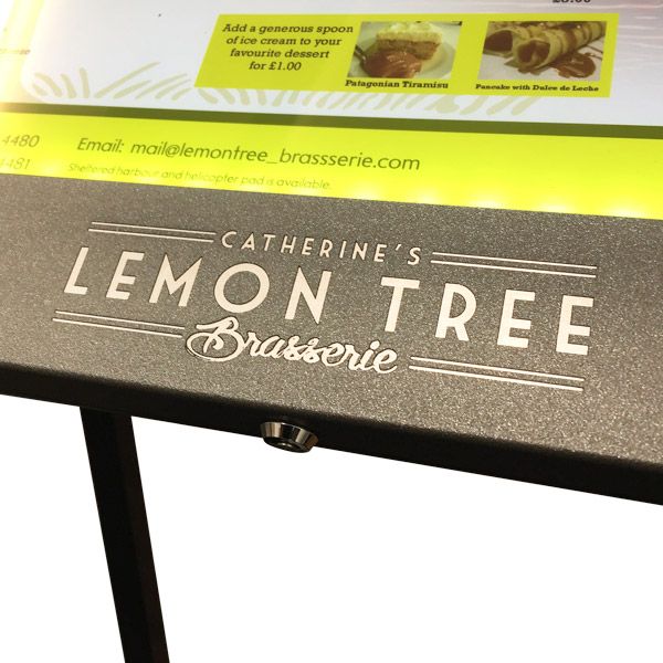 Metal engraved menu case header