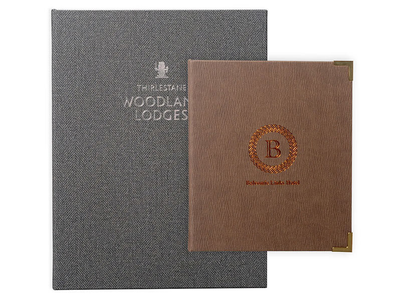 Wood,Leather,fabric Guest information booklets and room folders.